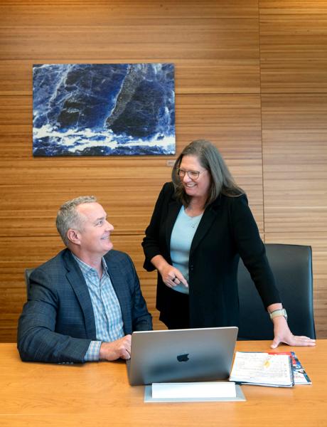 Mitch Kennedy, JAX executive vice president and JMCRS president (left), and Mary Dickinson, Ph.D., JAX executive vice president and chief scientific officer.