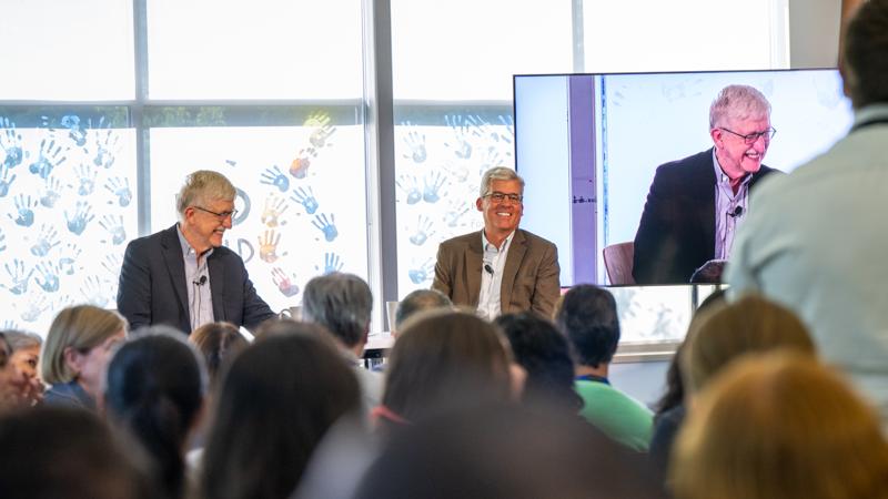 Francis Collins (left), former director of the NIH, participates in a fireside chat with JAX President and CEO Lon Cardon. July 2025.