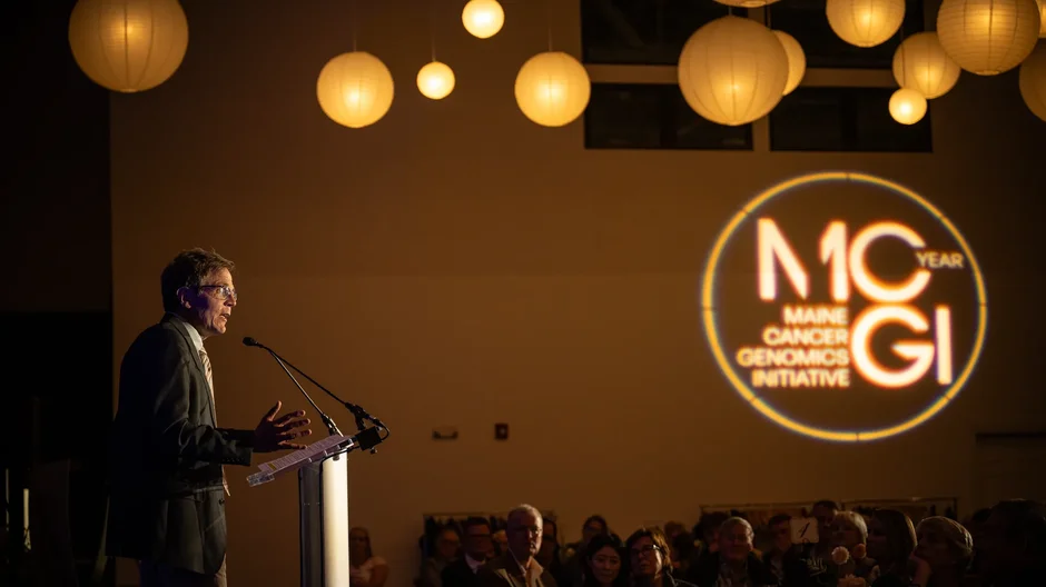 JAX’s Chief Medical Officer and Medical Director of MCGI Jens Reuter, speaks at the MCGI 10-year event in Maine in October 2026. Credit: Luke Madden, The Jackson Laboratory.